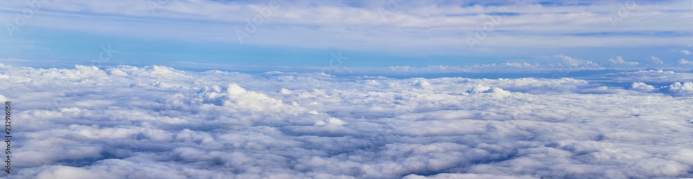 Aerial Cloudscape view over midwest states on flight over Colorado, Kansas, Missouri, Illinois, Indiana, Ohio and West Virginia during autumn. Grand sweeping views of landscape and clouds. Views of cr Aerial Cloudscape view over midwest states on flight over Colorado, Kansas, Missouri, Illinois, Indiana, Ohio and West Virginia during autumn. Grand sweeping views of landscape and clouds. Views of cr