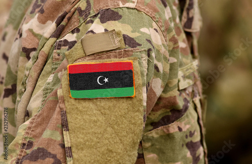 Libya flag on soldiers arm. Libyan army (collage)