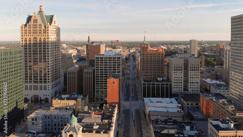 Milwaukee river in downtown, harbor districts of Milwaukee, Wisconsin, United States. Real estate, condos in downtown. Aerial view, drone flying photo