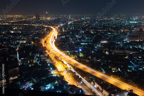 EXPRESS WAY cutting through Bangkok business capital of thailand. big street for automobile in a dense urban area.