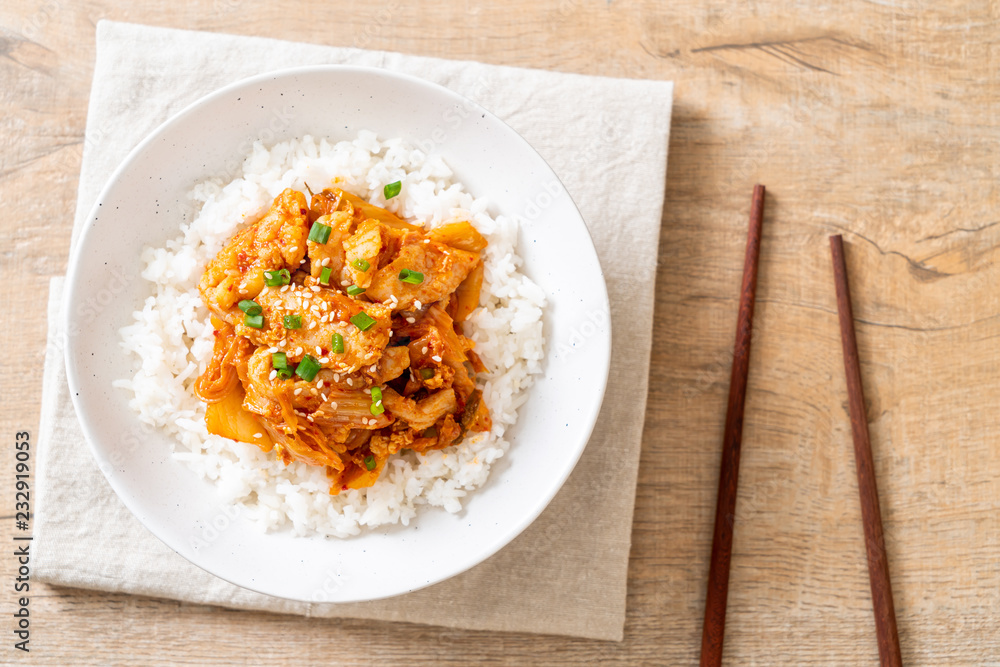 stir-fried pork with kimchi on topped rice stir-fried pork with kimchi on topped rice