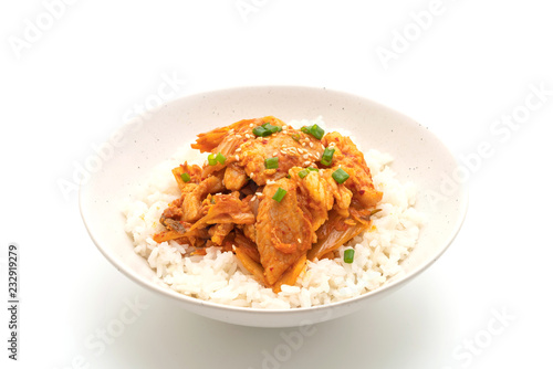 stir-fried pork with kimchi on topped rice isolated on white background