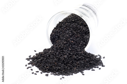 Close up black organic sesame on white background. Health food concept.