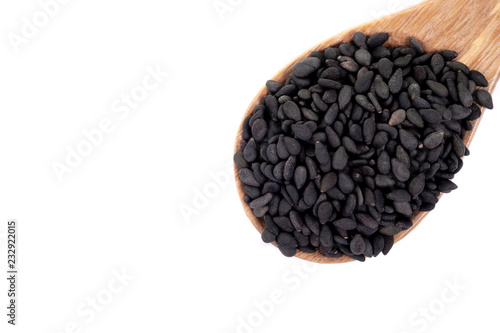 Close up black organic sesame on white background. Health food concept.