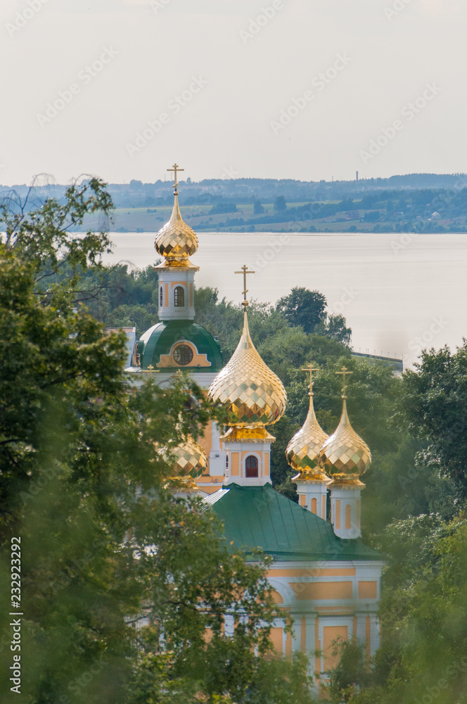 Plyos, Ivanovo Oblast, Russia - July 9, 2013: Church of the Resurrection after restoration. View of the streets of the old Russian city