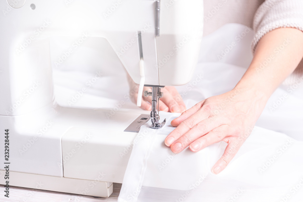 Woman working with sewing machine