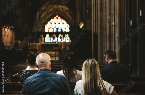 Photographie Churchgoers sitting in the pew