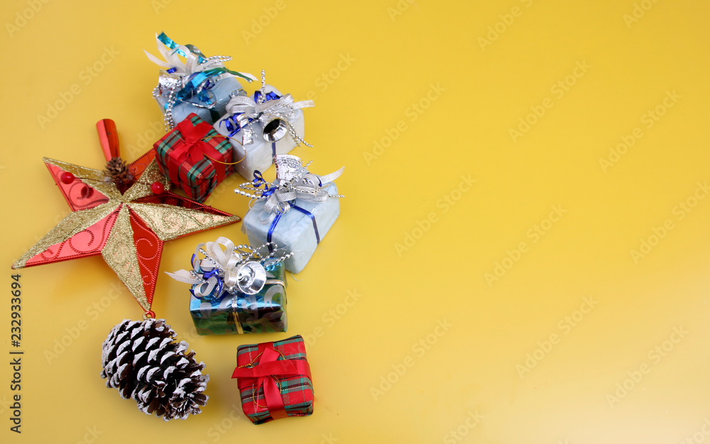 Naklejka premium Christmas Decoration with Yellow Backdrop.