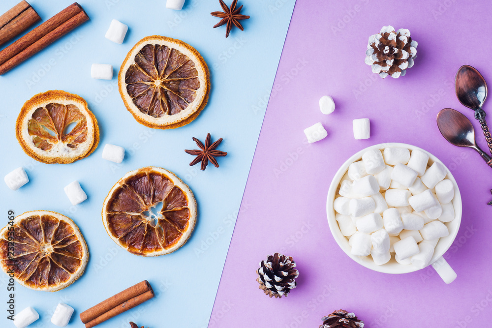 Decoration for Christmas concept. Food oranges nuts spices pine cones Christmas tree on blue pastel background with copy space. Decoration for Christmas concept. Food oranges nuts spices pine cones Christmas tree on blue pastel background with copy space.