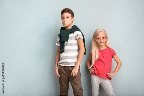 Cute boy and girl in fashio...