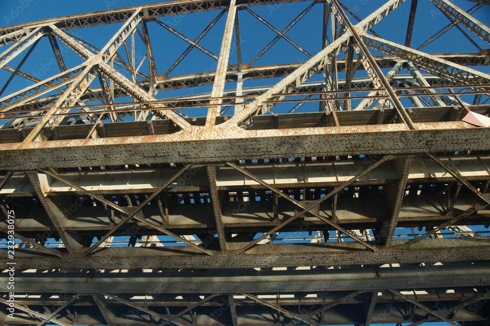 Railway bridge over the river. Bug valley. View of the metal structure of the river. Railway bridge over the river. Bug valley. View of the metal structure of the river.