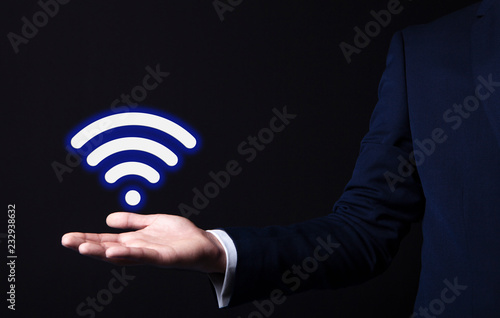 wifi icon in businessman hand
