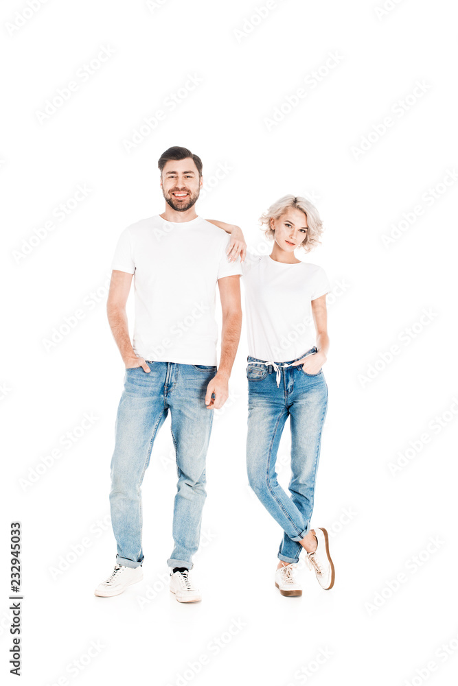 Wonderful smiling couple standing together while woman leaning to man isolated on white Wonderful smiling couple standing together while woman leaning to man isolated on white