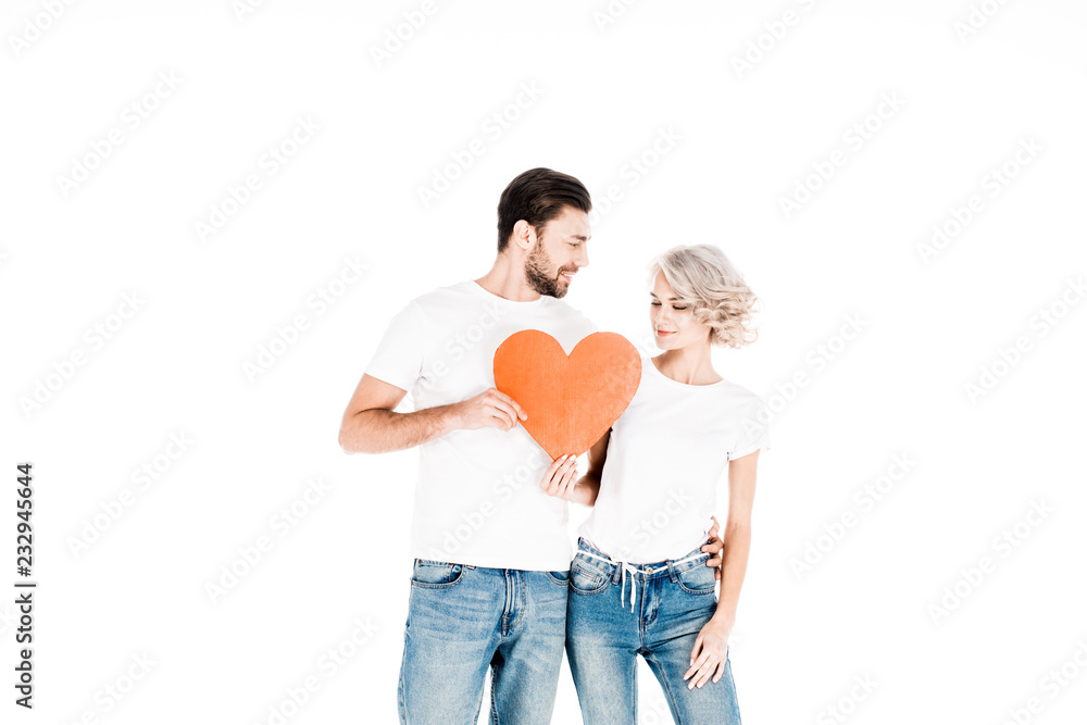 Great attractive couple holding signs love isolated on white Great attractive couple holding signs love isolated on white
