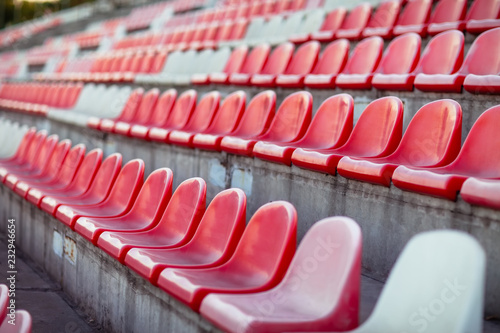 Rows of empty seats in a sports stadium