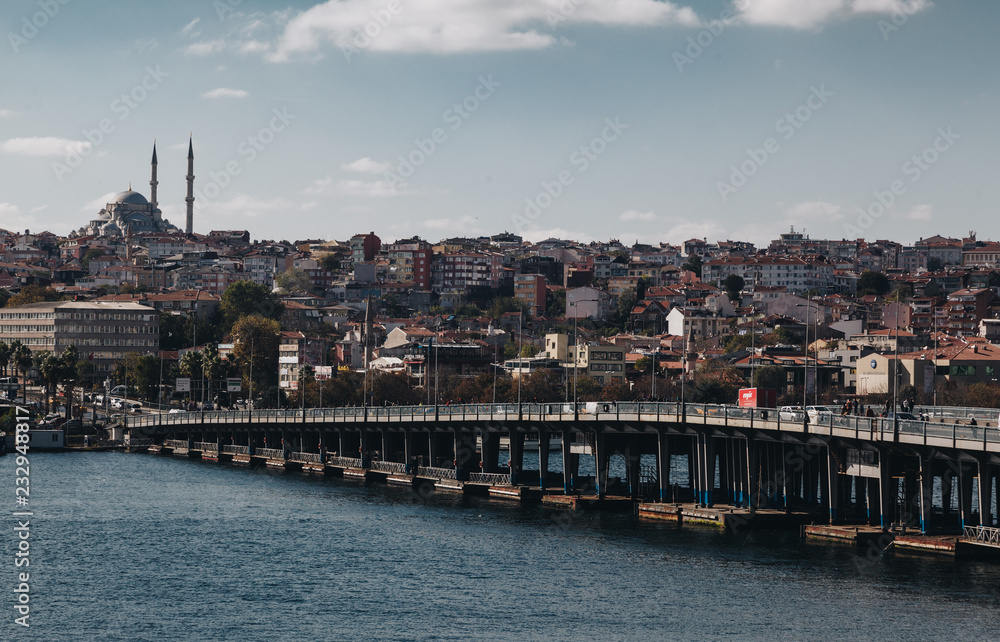 view of bridge and panorama of Istanbul with modern building and sky clouds in the background, turkey.