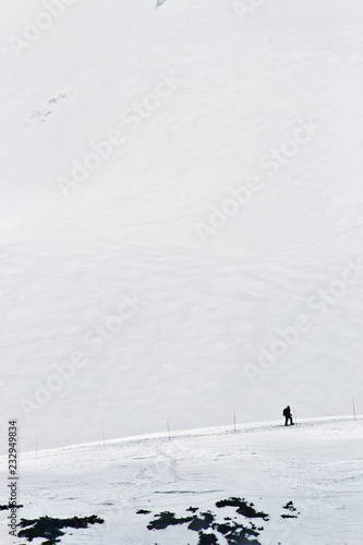 alone ski man on snow hill