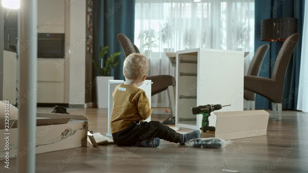 Little child installing a locker with child - DIY Little child installing a locker with child - DIY