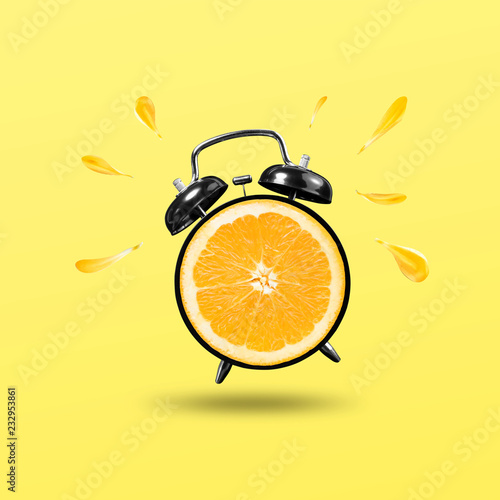 freshing time with orange clock on yellow