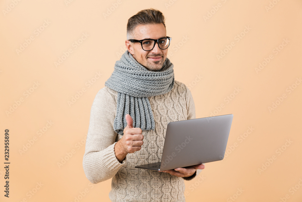 Portrait if a happy man dressed in sweater Portrait if a happy man dressed in sweater