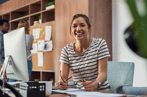 Bild auf Leinwand Cheerful young business woman