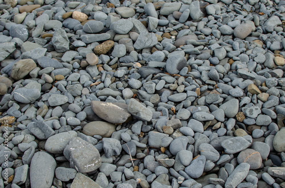 Background photograph of some stones of a Menorca beach. Background photograph of some stones of a Menorca beach.