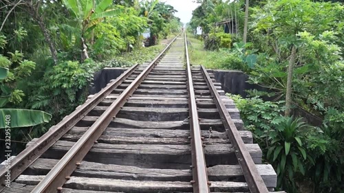 view of railway bridge from a moving trolley cart
