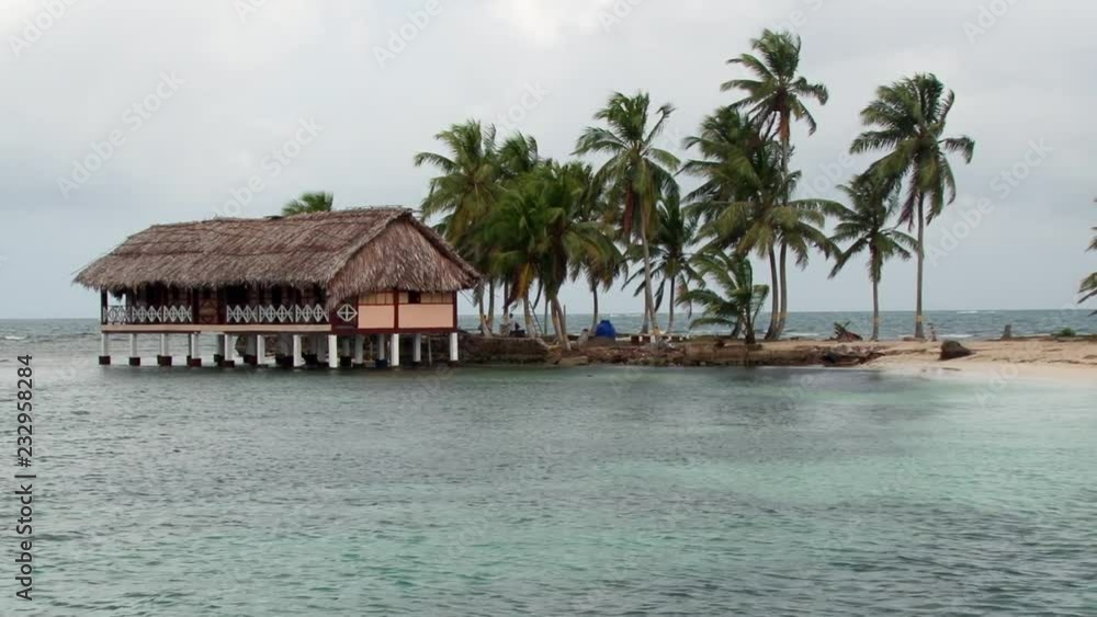Elevated thatched hut on beach  in the San Blas Islands