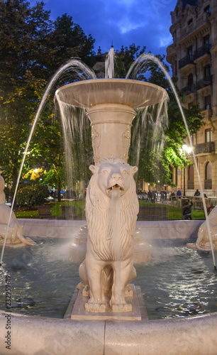 Fountain in a Plaza Jado square in Bilbao, at night photo