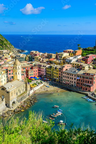 Vernazza - Village of Cinque Terre National Park at Coast of Italy. Beautiful colors at sunset. Province of La Spezia, Liguria, in the north of Italy - Travel destination and attractions in Europe.