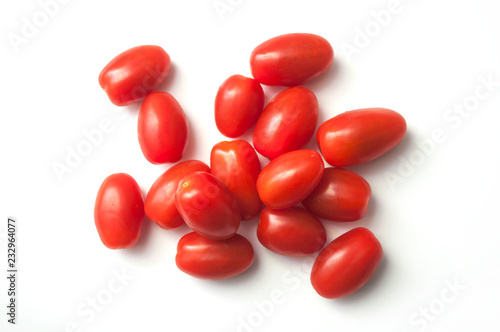 Canvas Print closeup of mini organic tomatoes roma on white background
