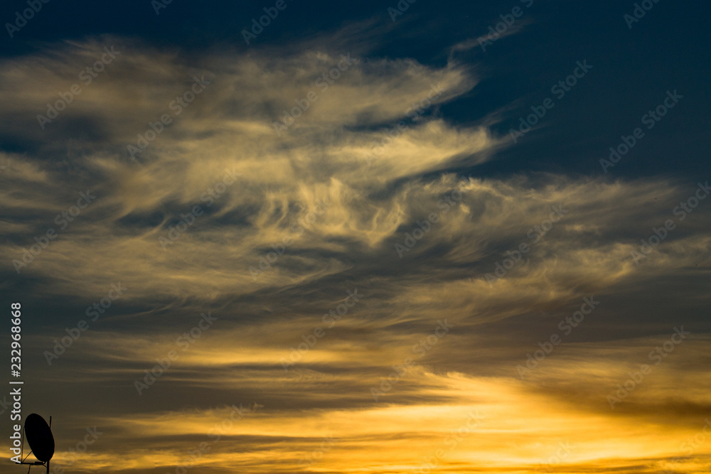 Fototapeta premium Sunset in dramatic sky with clouds.