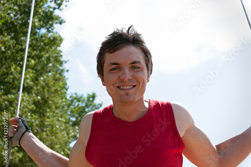 Young man on a swing