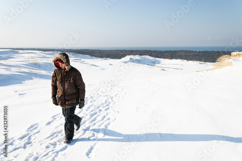 Man walking in the snow