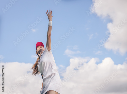 Young girl in sportswear playing tennis © AboutLife