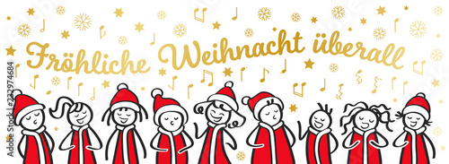 Weihnachtschor, Sternsinger, Chor, Banner, lustige Strichfiguren singen Weihnachtslied Fröhliche Weihnacht überall photo