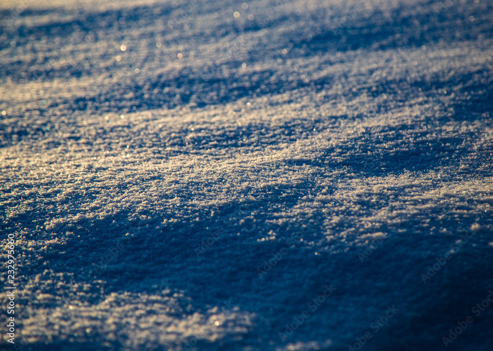 Obraz premium Snow at sunrise as an abstract background