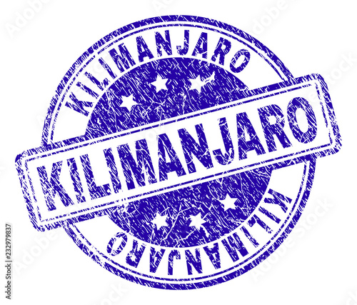 KILIMANJARO stamp seal imprint with grunge texture. Designed with rounded rectangles and circles. Blue vector rubber print of KILIMANJARO title with retro texture.