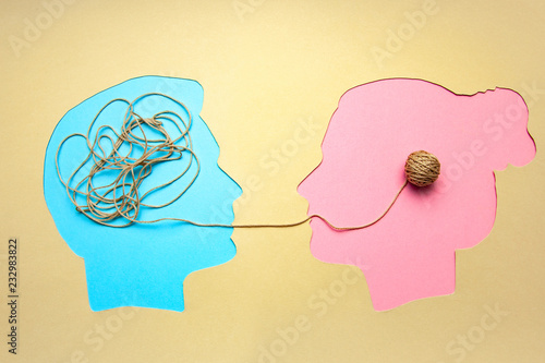 Two people communicate face to face, man and woman. Concept decoding and understanding problem or rational and irrational thinking, conflict. Ordering thoughts into structure