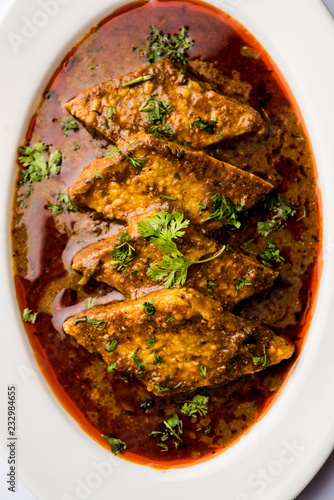 Patodi Rassa Bhaji or patwadi Sabji, a popular Maharashtrian spicy recipe served with Chapati and salad. Selective focus photo