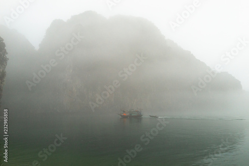 boat on the lake with foggy weather © Nicolai