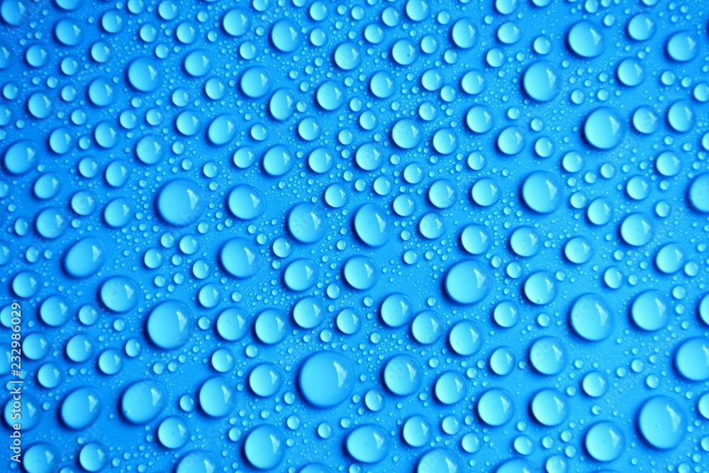 drops water on blue background drops water on blue background