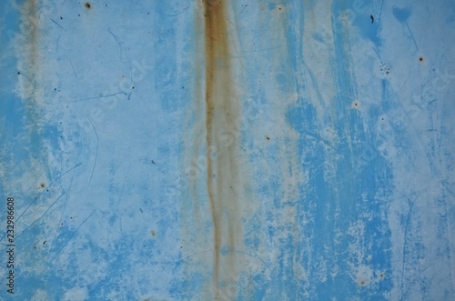 rust on old blue wall background