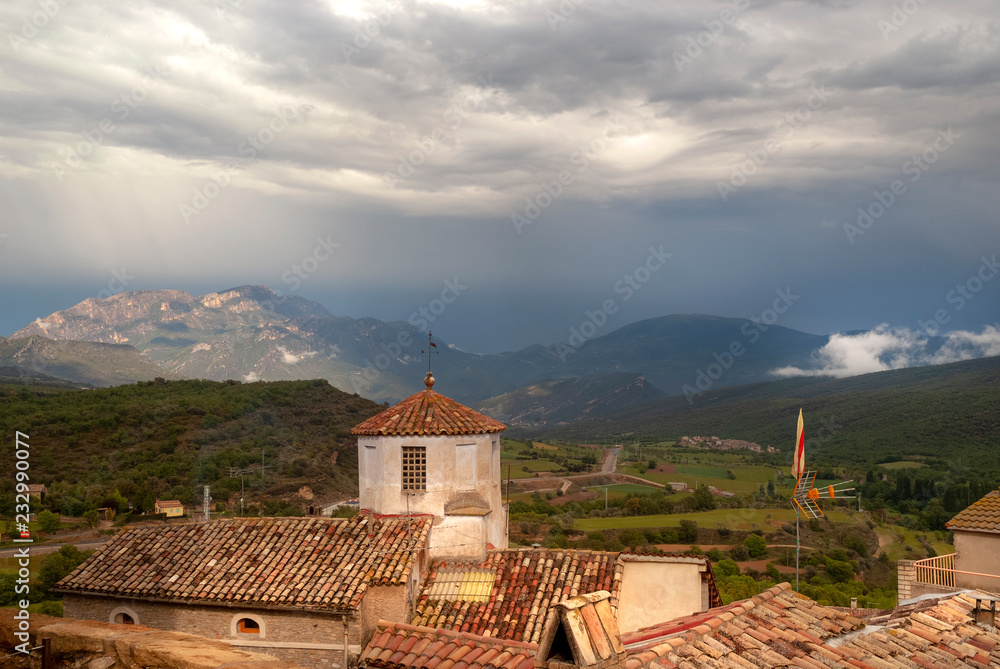 catalán rooftops and approaching storm