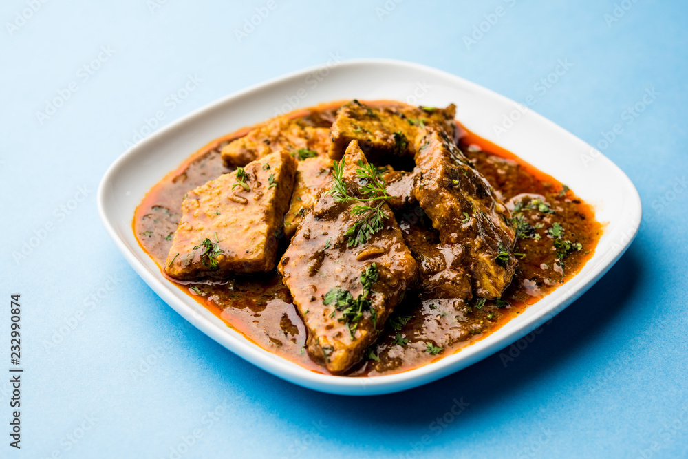 Patodi Rassa Bhaji or patwadi Sabji, a popular Maharashtrian spicy recipe served with Chapati and salad. Selective focus Patodi Rassa Bhaji or patwadi Sabji, a popular Maharashtrian spicy recipe served with Chapati and salad. Selective focus