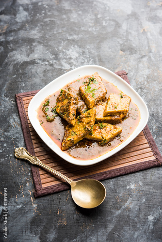 Patodi Rassa Bhaji or patwadi Sabji, a popular Maharashtrian spicy recipe served with Chapati and salad. Selective focus photo