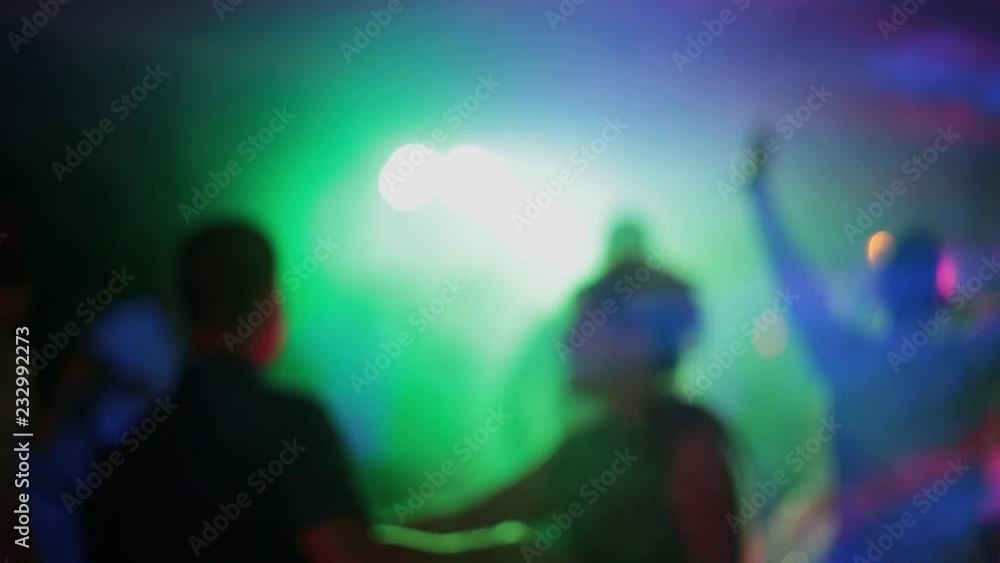 Dancing people in defocus, soft bokeh. Dancing people in defocus, soft bokeh.