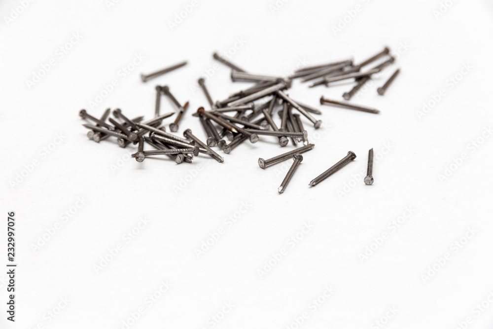 Set of metal nails on the white background Set of metal nails on the white background