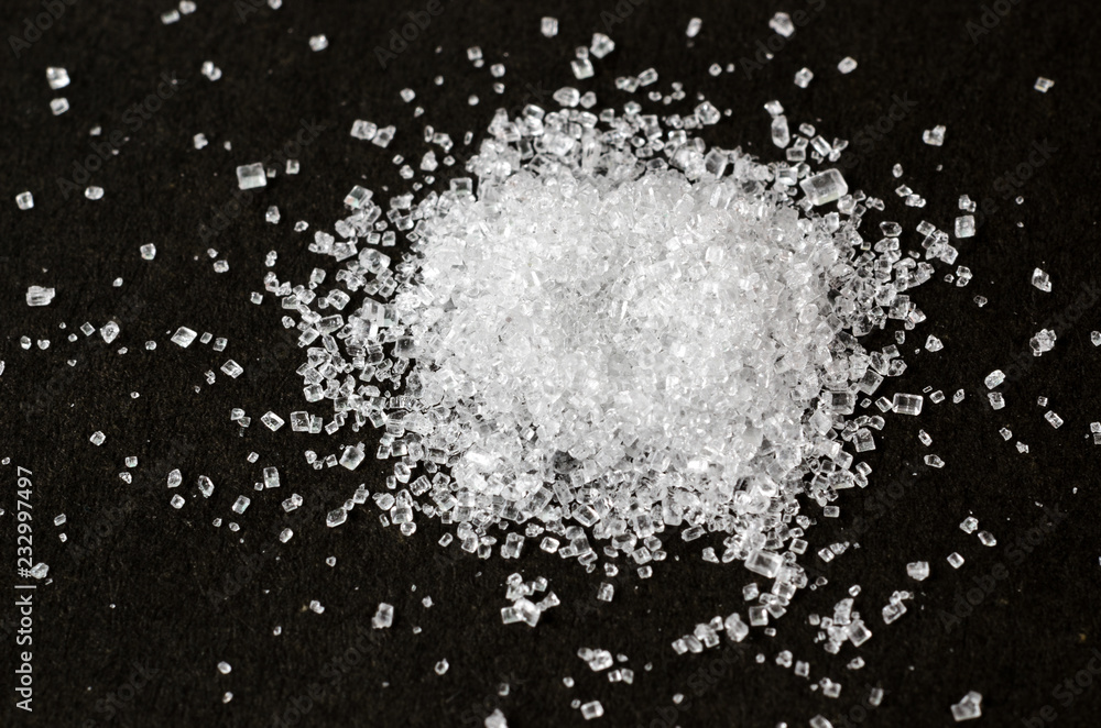 Sugar on black background Sugar on black background