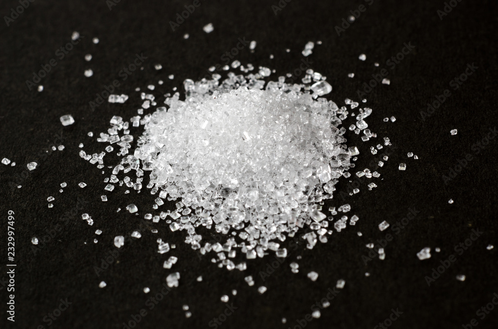 Sugar on black background Sugar on black background